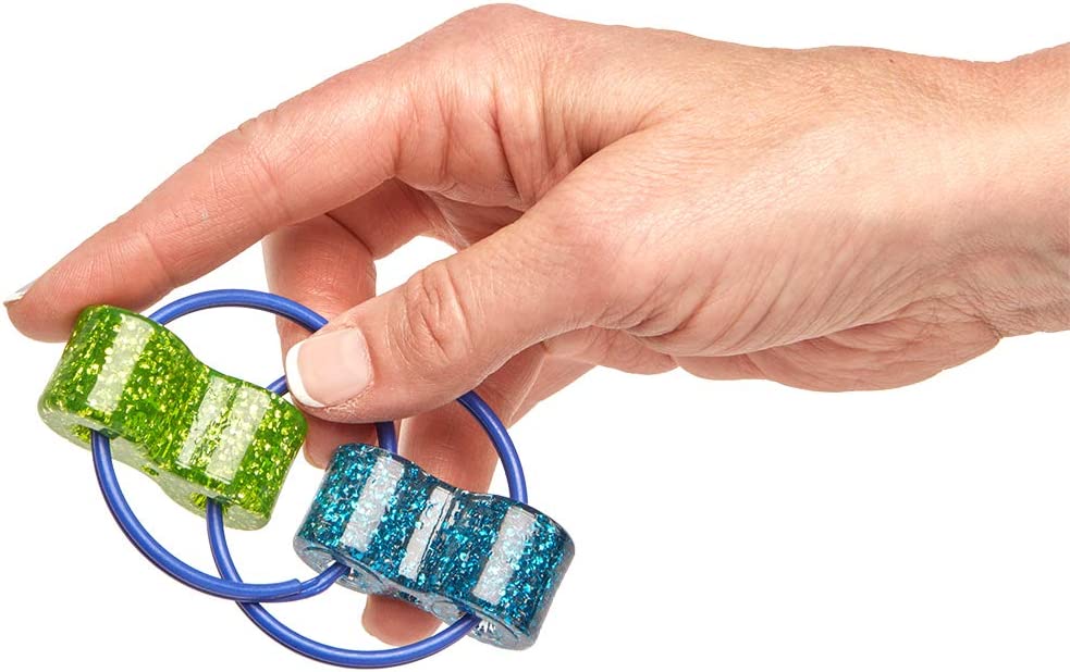 An adult hand with light skin tone holds the green and blue Loopeez Fidget Toy.