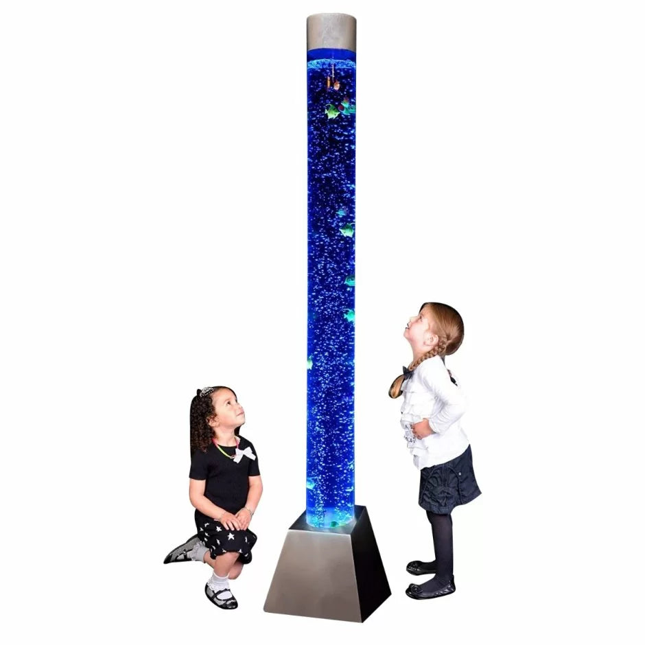 Two children stand on either side of the Bubble Tube Aquarium. One is kneeling and the other is standing. Both are looking up at the floating fish.