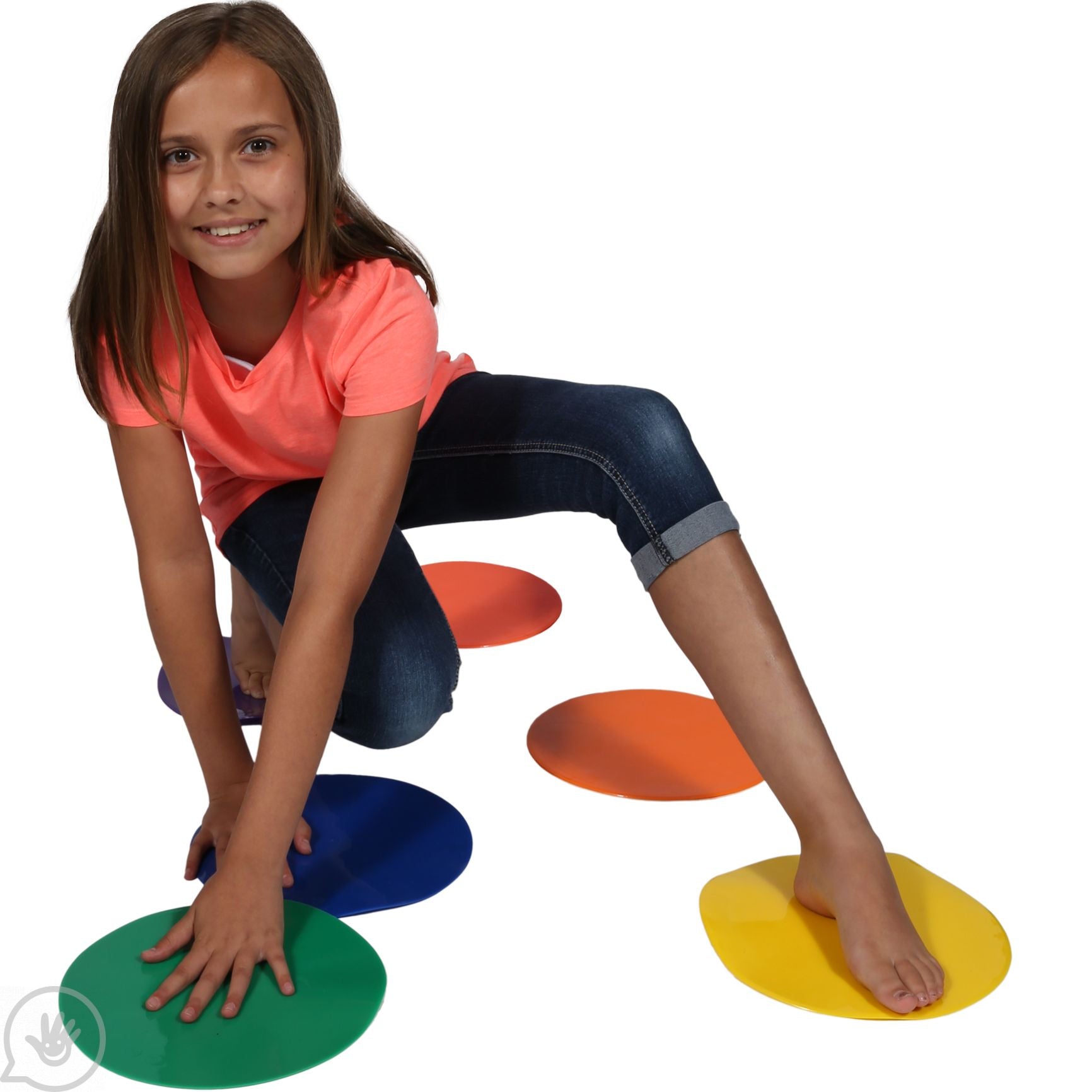 A child with medium light skin tone and shoulder length brown hair is positions above the Spot Markers. Their feet and hands are spread across different colored markers and they are smiling.