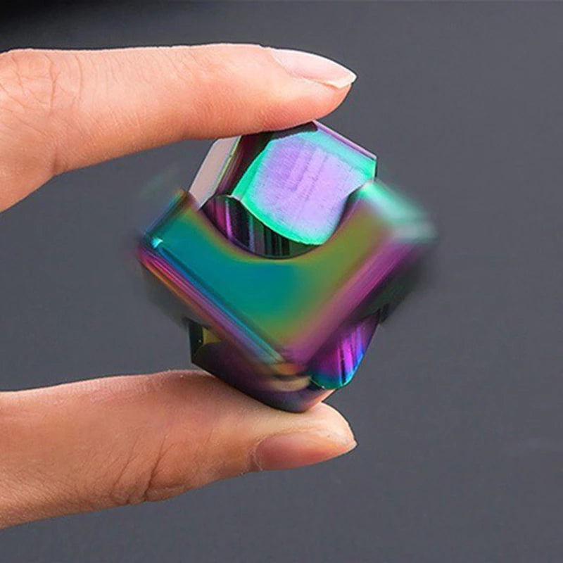 The oil slick Metal Fidget Cube spinning.