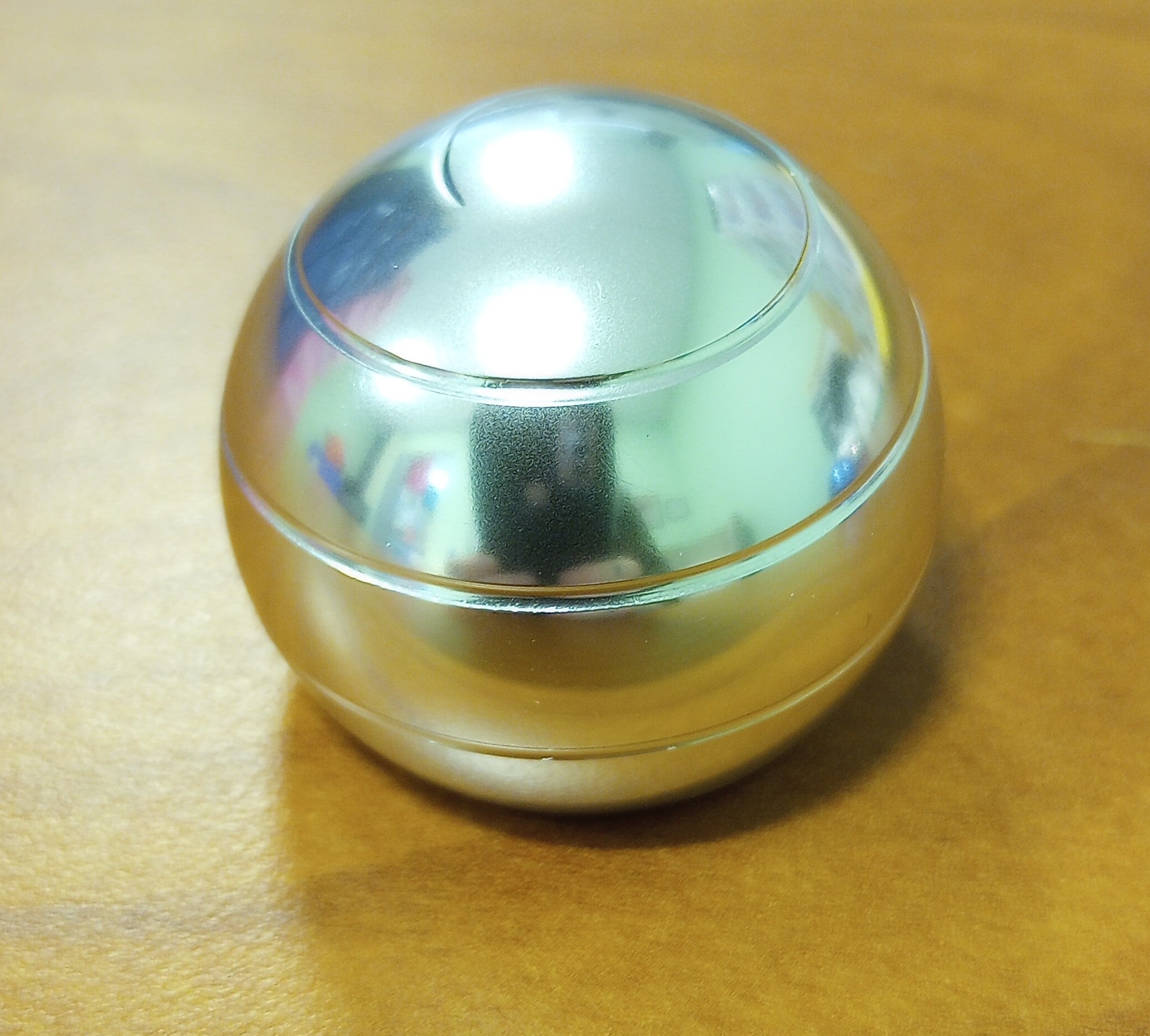 The Silver Spinnning Desktop Gyroscope.