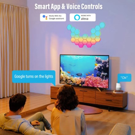 Two people sit on a couch in front of a flat screen TV across the living room. There is a display of the Hexagon Lights above the television with text that lets the reader know that there are Smart App and Voice Controls.
