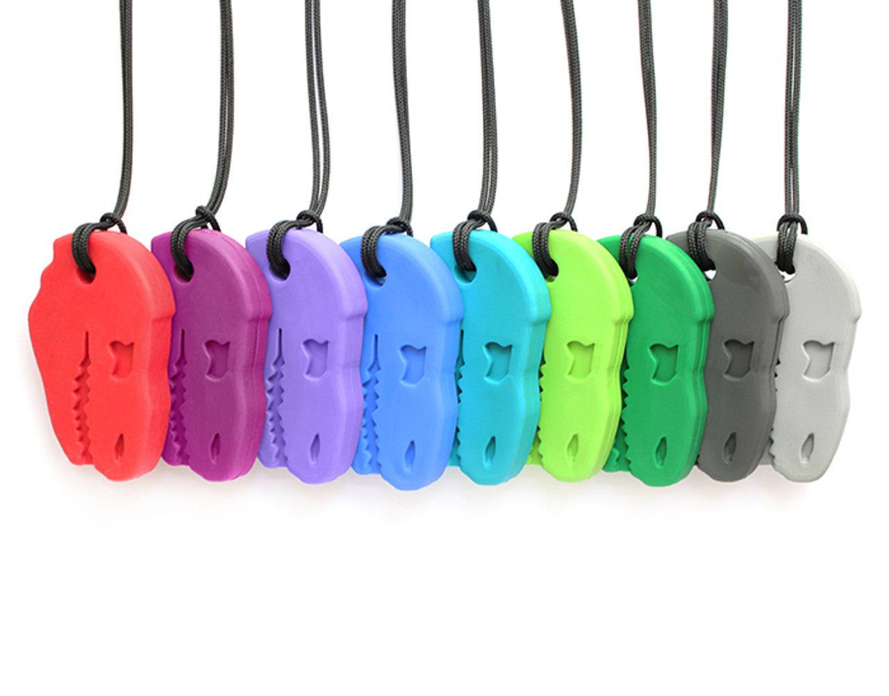 The Dino-Bite Chew Necklace in a variety of colors.