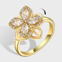 The gold Four Leaf Clover ring.