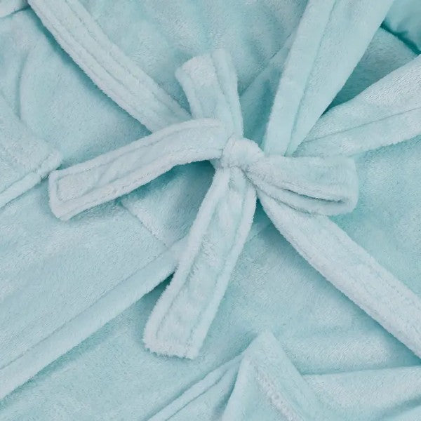 The strap of the light blue robe is tied into a bow.