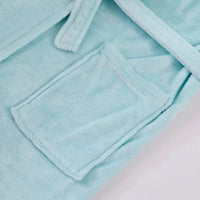 A front pocket on the light blue robe.
