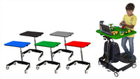 A display of the range of colors of Sit-Stand Mobile Student Desks. To the right a child with light skin tone and short brown hair plays with blocks at the desk with an iPad securered to the desk top.