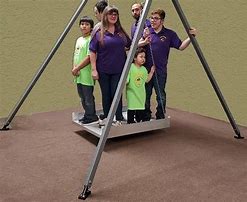 A group of adults and children stand on a low swing attached to the Swing All Portable Stand.
