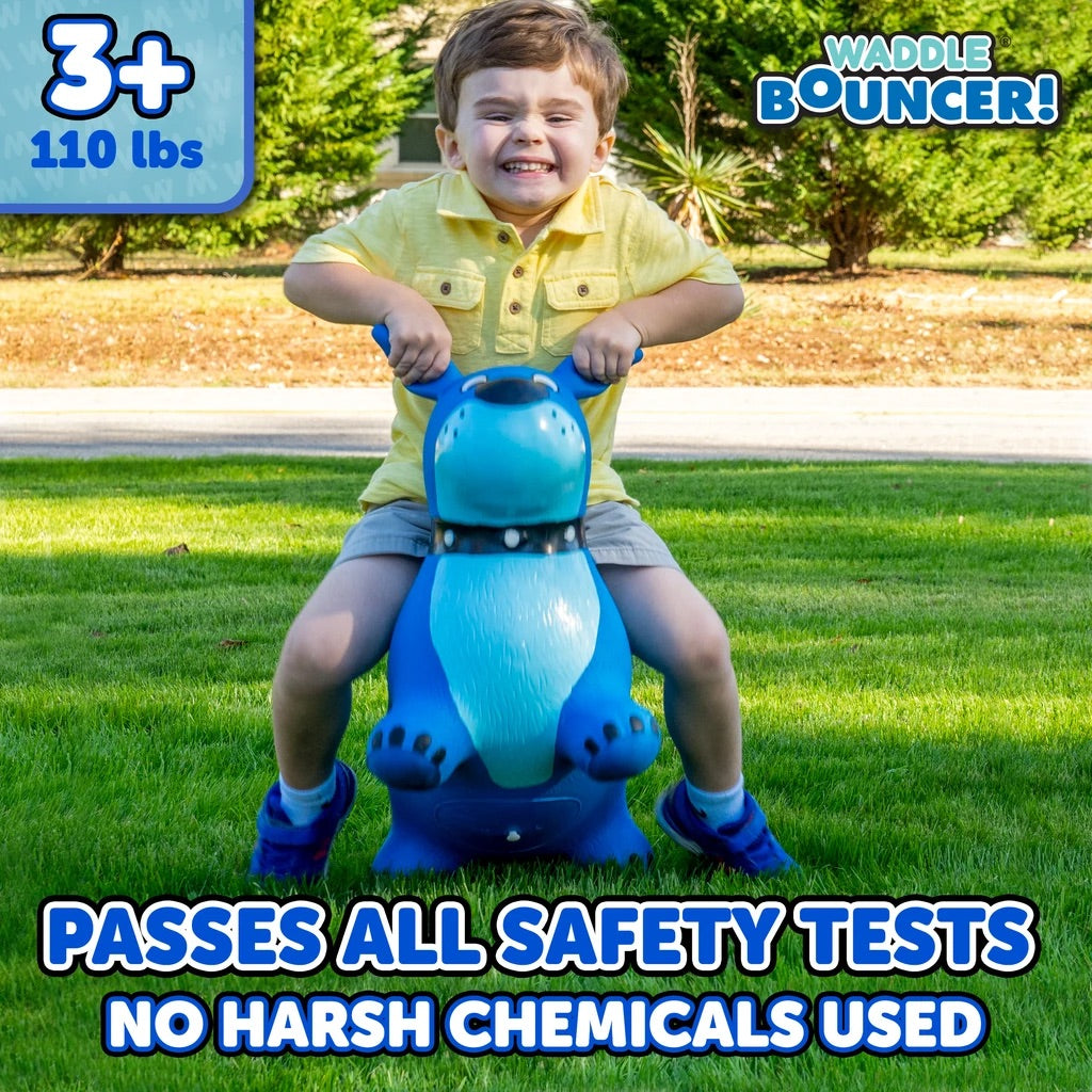A child with light skin tone and short bown hair is jumping up on the blue dog Waddle Bouncer. The text says: 3+, 110 lbs, passes all safety tests, and no harsh chemicals used.