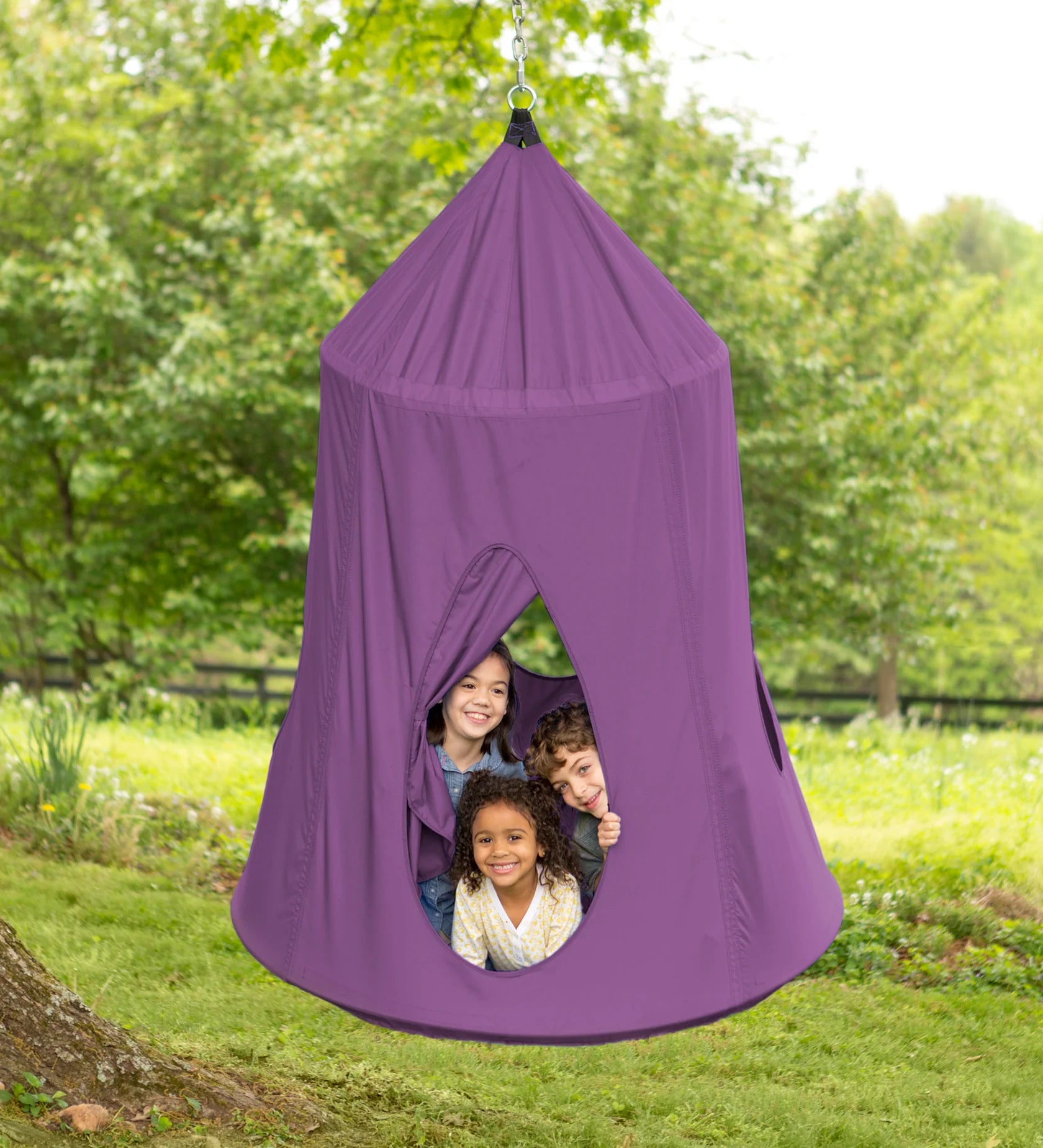 Three children poke their heads out of the door of the HugglePod HangOut Nylon Hanging Tent.
