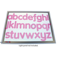 The SiliShapes Trace Alphabet displayed on top of a light panel (not included).