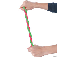 Two hands with light skin tone are holding either end of two Stretchy Strings. The strings are overlapping each other.
