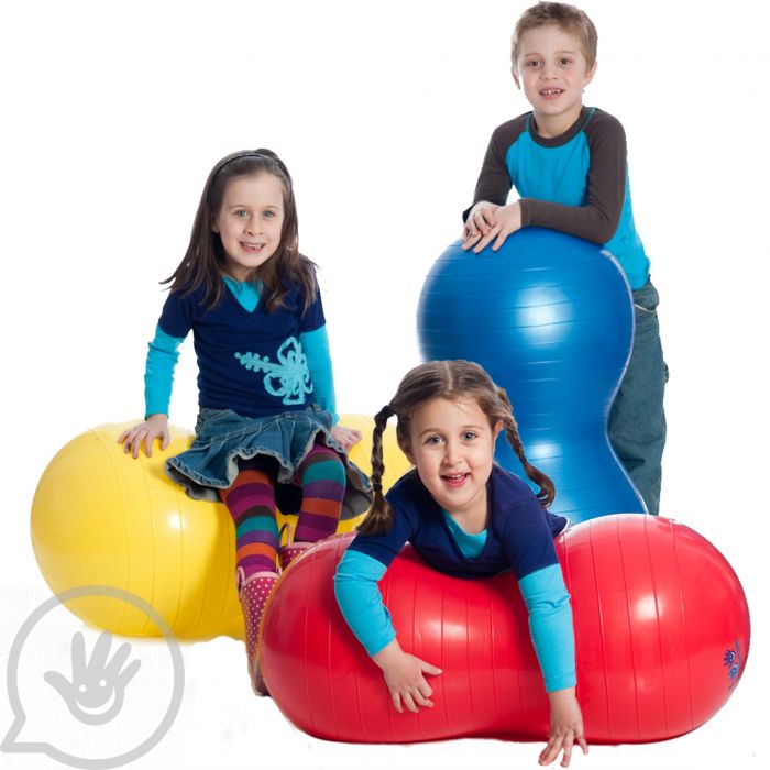 Three children sit, stand, and lie on three different sized Peanut Balls.