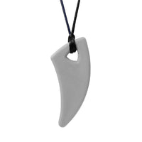 A light grey Saber Tooth Chewable Necklace.