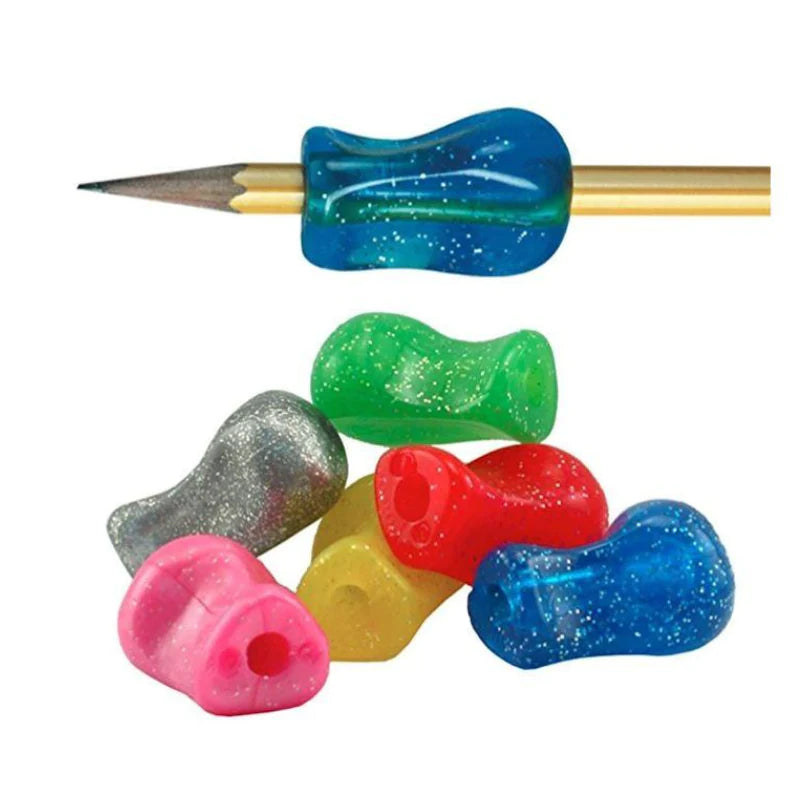 An assorted collection of The Pencil Grip Glitter, including one of the Grips on a pencil.