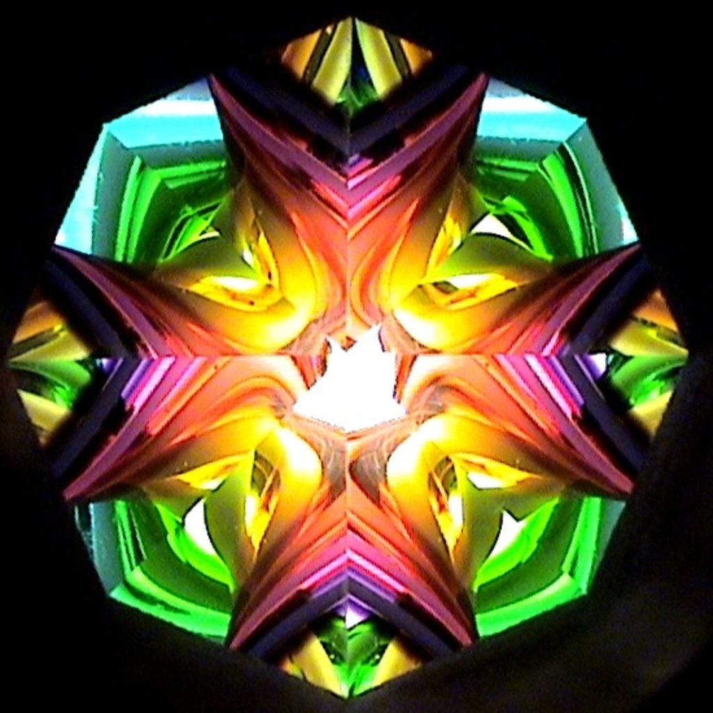 A peak at the bright patterned colors that can be seen looking through the Metallic Marble Kaleidoscope.
